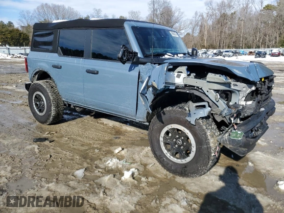 2023 Ford Bronco with VIN 1FMEE5DP0PLB17111, listed as a Copart auction lot 86588374 with 26,093 mi miles and Salvage Title. Bid and sale history available at DreamBid. Image 4.