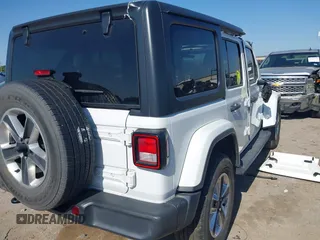 2019 Jeep Wrangler Unlimited Sahara with VIN 1C4HJXEG0KW577917, listed as a IAAI auction lot 41993670 with 90,584 mi miles and . Bid and sale history available at DreamBid. Image 4.