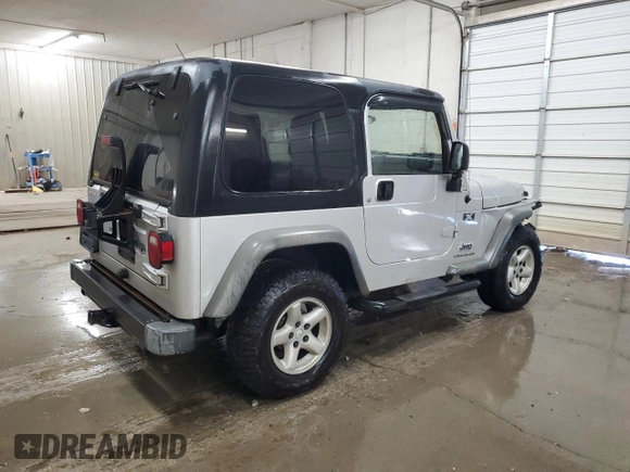 2003 Jeep Wrangler X with VIN 1J4FA39S43P350248, listed as a Copart auction lot 52089395 with 162,524 mi miles and Salvage Title. Bid and sale history available at carsss.com. Image 3.