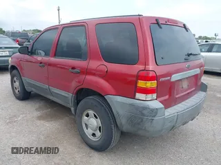 2005 Ford Escape XLS Value with VIN 1FMYU02Z35KB05027, listed as a IAAI auction lot 42025362 with 208,413 mi miles. Bid and sale history available at carsss.com. Image 3.