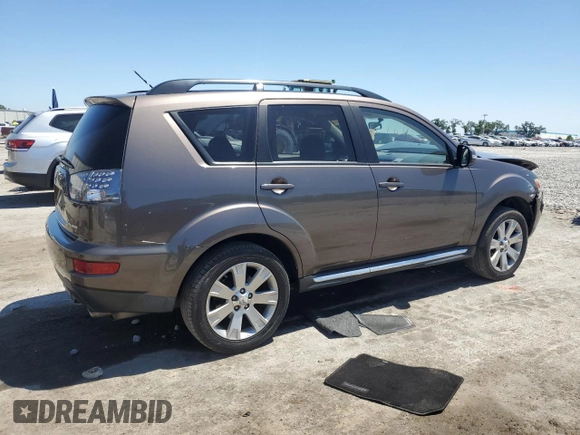 2010 Mitsubishi Outlander SE z VIN JA4AS3AW3AZ004523, wystawiony jako Copart lot #52864695 z przebiegiem 133 500 mil mil oraz Szkoda całkowita • Salvage title. Historia ofert i sprzedaży dostępna na DreamBid. Obrazek 3.