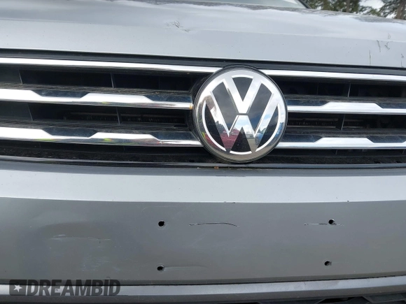 2021 Volkswagen Tiguan SE with VIN 3VV3B7AX0MM008809, listed as a IAAI auction lot 42077986 with 70,780 mi miles and . Bid and sale history available at DreamBid. Image 17.