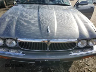 2003 Jaguar XJ 8 z VIN SAJDA14C83LF55424, wystawiony jako Copart lot #86324864 z przebiegiem 110 244 mil mil oraz Szkoda całkowita • Salvage title. Historia ofert i sprzedaży dostępna na DreamBid. Obrazek 11.
