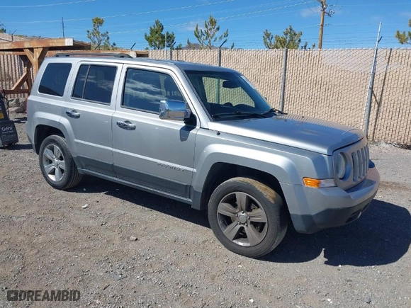 2014 Jeep Patriot Latitude with VIN 1C4NJRFB6ED883893, listed as a IAAI auction lot 41780864 with 119,610 mi miles. Bid and sale history available at carsss.com. Image 1.