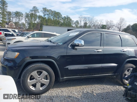 2013 Jeep Grand Cherokee Limited with VIN 1C4RJEBGXDC520609, listed as a IAAI auction lot 41493503 with 173,020 mi miles. Bid and sale history available at carsss.com. Image 14.