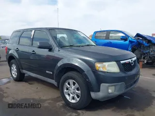 2008 Mazda Tribute ES with VIN 4F2CZ06188KM01024, listed as a IAAI auction lot 41890148 with 122,367 mi miles. Bid and sale history available at carsss.com. Image 1.