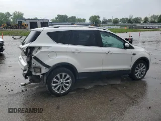 2018 Ford Escape Titanium z VIN 1FMCU9J94JUB49827, wystawiony jako Copart lot #55697385 z przebiegiem 98 682 mil mil oraz Szkoda całkowita • Salvage title. Historia ofert i sprzedaży dostępna na DreamBid. Obrazek 3.