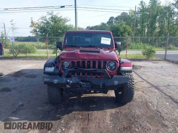 2021 Jeep Gladiator Mojave with VIN 1C6JJTEG8ML592381, listed as a IAAI auction lot 42369581 with 75,295 mi miles and . Bid and sale history available at DreamBid. Image 13.
