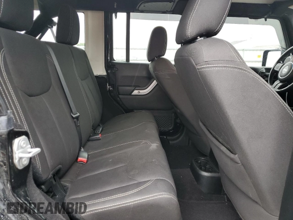 2017 Jeep Wrangler Unlimited Sahara with VIN 1C4BJWEGXHL594203, listed as a Copart auction lot 57359515 with 101,763 mi miles and Salvage title. Bid and sale history available at DreamBid. Image 11.