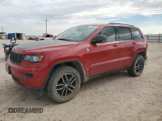 2018 Jeep Grand Cherokee Trailhawk with VIN 1C4RJFLGXJC477597, listed as a Copart auction lot 56338075 with 91,443 mi miles and Salvage title. Bid and sale history available at DreamBid. Image 1.