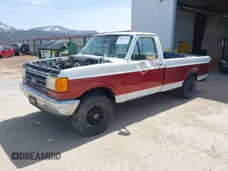 1990 Ford F-150 with VIN 1FTEF14N0LKA50583, listed as a IAAI auction lot 41991153 with 75,504 mi miles. Bid and sale history available at carsss.com. Image 2.