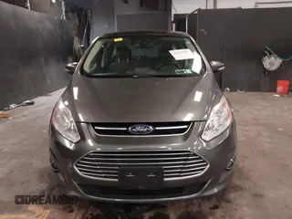 2013 Ford C-Max SEL z VIN 1FADP5BU9DL531704, wystawiony jako IAAI lot #42228841 z przebiegiem 91 808 mil mil oraz . Historia ofert i sprzedaży dostępna na DreamBid. Obrazek 12.