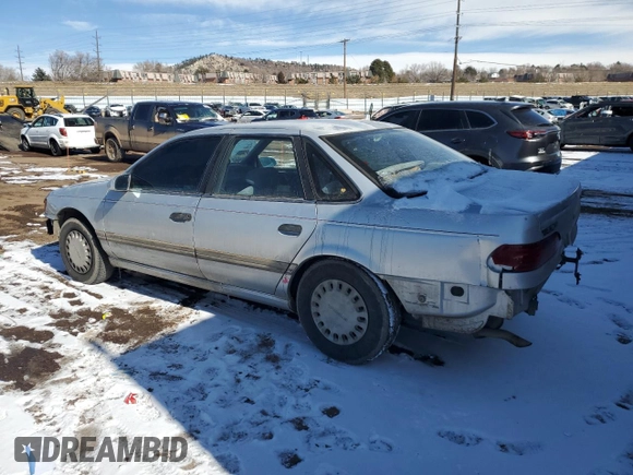 1993 Ford Taurus with VIN 1FACP5242PG162676, listed as a Copart auction lot 45177445 with 73,771 mi miles and Non repairable. Bid and sale history available at DreamBid. Image 2.