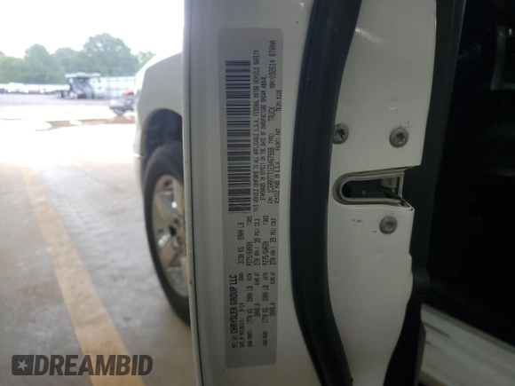 2014 Ram 1500 Big Horn with VIN 1C6RR7TT1ES467958, listed as a Copart auction lot 60890725 with 192,833 mi miles and Salvage title. Bid and sale history available at DreamBid. Image 12.