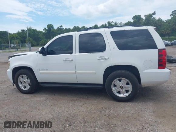 2007 Chevrolet Tahoe LTZ with VIN 1GNFC13J47J336516, listed as a IAAI auction lot 42545424 with 211,669 mi miles and . Bid and sale history available at DreamBid. Image 14.