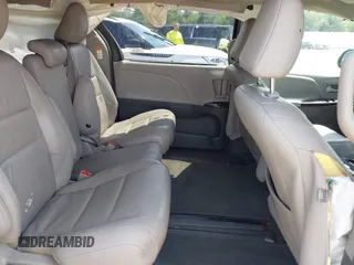 2015 Toyota Sienna XLE with VIN 5TDYK3DCXFS633128, listed as a IAAI auction lot 42527073 with 149,926 mi miles and . Bid and sale history available at DreamBid. Image 8.