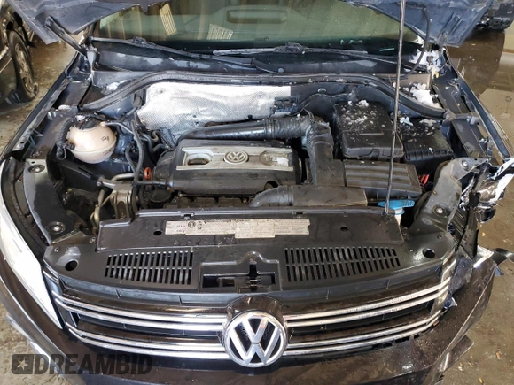 2013 Volkswagen Tiguan SE z VIN WVGBV7AX9DW529234, wystawiony jako Copart lot #41610635 z przebiegiem 130 566 mil mil oraz Szkoda całkowita • Salvage title. Historia ofert i sprzedaży dostępna na DreamBid. Obrazek 12.