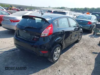2019 Ford Fiesta SE with VIN 3FADP4EJ5KM113535, listed as a IAAI auction lot 39659709 with 100,730 mi miles. Bid and sale history available at carsss.com. Image 4.