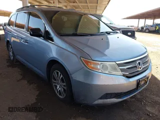 2011 Honda Odyssey EX-L with VIN 5FNRL5H61BB085486, listed as a IAAI auction lot 42573135 with 194,310 mi miles and . Bid and sale history available at DreamBid. Image 1.