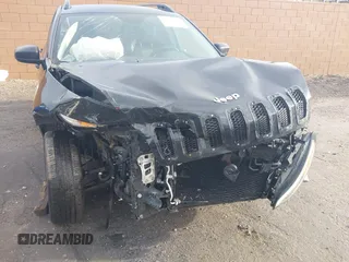 2016 Jeep Cherokee Sport with VIN 1C4PJLASXGW347372, listed as a IAAI auction lot 41788589 with 168,247 mi miles and . Bid and sale history available at DreamBid. Image 6.