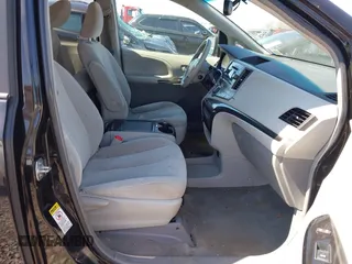 2014 Toyota Sienna LE AAS with VIN 5TDKK3DC4ES445998, listed as a IAAI auction lot 42093872 with 220,943 mi miles. Bid and sale history available at carsss.com. Image 5.