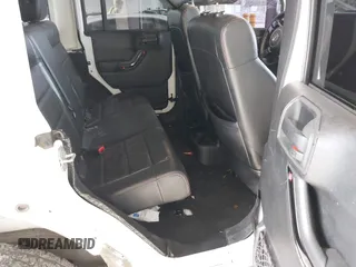 2012 Jeep Wrangler Unlimited Sahara with VIN 1C4BJWEG7CL275883, listed as a IAAI auction lot 42510764 with 149,531 mi miles and . Bid and sale history available at DreamBid. Image 8.