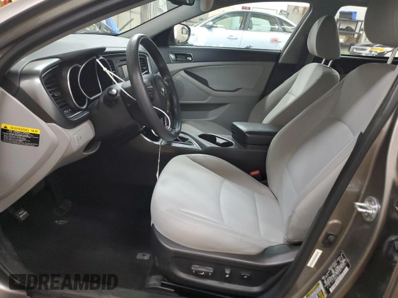 2015 Kia Optima LX with VIN 5XXGM4A78FG414351, listed as a Copart auction lot 52863865 with 104,518 mi miles and Salvage Title. Bid and sale history available at carsss.com. Image 7.