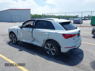 2021 Audi Q3 S line Premium Plus z VIN WA1EECF33M1024605, wystawiony jako IAAI lot #42062366 z przebiegiem 94 641 mil mil oraz . Historia ofert i sprzedaży dostępna na DreamBid. Obrazek 3.