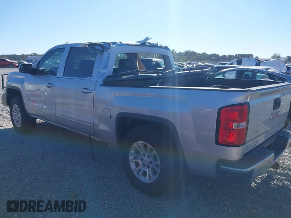 2017 GMC Sierra 1500 SLE with VIN 3GTU2MEC3HG199980, listed as a IAAI auction lot 40534708 with 129,765 mi miles and . Bid and sale history available at DreamBid. Image 3.