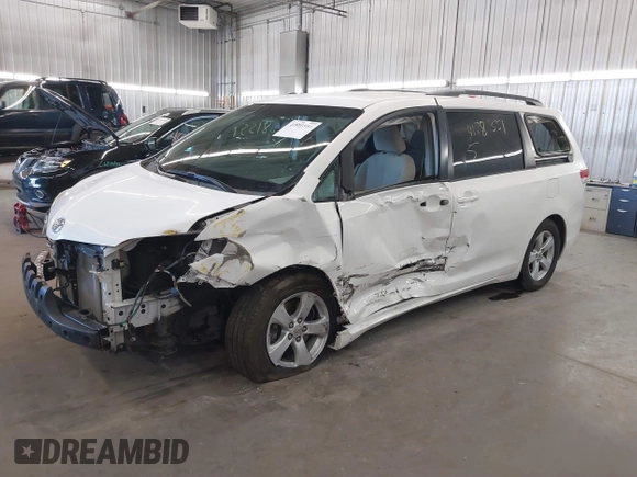 2011 Toyota Sienna LE AAS with VIN 5TDKK3DC6BS144970, listed as a IAAI auction lot 41881551 with 168,148 mi miles. Bid and sale history available at carsss.com. Image 18.