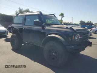 2023 Ford Bronco with VIN 1FMDE5CH2PLA96705, listed as a Copart auction lot 60813415 with 14,760 mi miles and Salvage title. Bid and sale history available at DreamBid. Image 4.