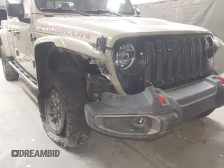 2020 Jeep Gladiator Rubicon z VIN 1C6JJTBGXLL178893, wystawiony jako IAAI lot #42206863 z przebiegiem 29 138 mil mil oraz . Historia ofert i sprzedaży dostępna na DreamBid. Obrazek 6.