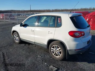 2011 Volkswagen Tiguan SEL with VIN WVGBV7AX7BW515233, listed as a IAAI auction lot 41234933 with 170,674 mi miles and . Bid and sale history available at DreamBid. Image 3.