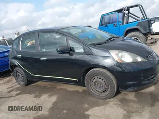 2010 Honda Fit with VIN JHMGE8H21AC039375, listed as a IAAI auction lot 42126138 with 123,077 mi miles. Bid and sale history available at carsss.com. Image 13.