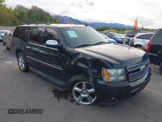 2011 Chevrolet Suburban LTZ with VIN 1GNSKKE34BR203562, listed as a IAAI auction lot 40628847 with 182,439 mi miles. Bid and sale history available at carsss.com. Image 1.