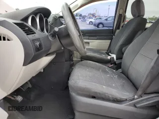 2008 Dodge Grand Caravan SE with VIN 2D8HN44H48R680046, listed as a Copart auction lot 42169125 with 198,035 mi miles and Salvage Title. Bid and sale history available at DreamBid. Image 7.
