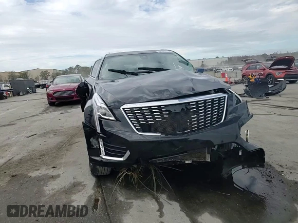 2023 Cadillac XT5 FWD Premium Luxury with VIN 1GYKNCRS0PZ138704, listed as a Copart auction lot 86849104 with 44,398 mi miles and Non Repairable. Bid and sale history available at carsss.com. Image 14.