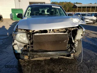 2010 Mazda Tribute Grand Touring with VIN 4F2CY0C74AKM03659, listed as a Copart auction lot 84494254 with 160,177 mi miles and Salvage Title. Bid and sale history available at carsss.com. Image 5.