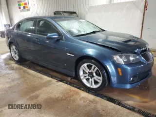 2009 Pontiac G8 with VIN 6G2ER57789L161792, listed as a Copart auction lot 43455795 with 127,236 mi miles and Salvage Title. Bid and sale history available at DreamBid. Image 4.