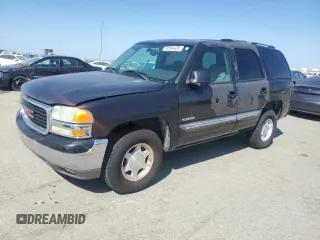 2004 GMC Yukon SLE z VIN 1GKEC13V94R131511, wystawiony jako Copart lot #53184435 z przebiegiem 163 917 mil mil oraz Tytuł czysty. Historia ofert i sprzedaży dostępna na DreamBid. Obrazek 1.