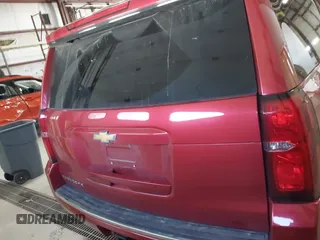 2015 Chevrolet Suburban LTZ z VIN 1GNSKKKC7FR218034, wystawiony jako IAAI lot #41884644 z przebiegiem 160 721 mil mil oraz . Historia ofert i sprzedaży dostępna na DreamBid. Obrazek 16.
