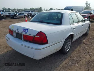 2002 Mercury Grand Marquis GS z VIN 2MEFM74W12X630926, wystawiony jako IAAI lot #42480472 z przebiegiem 58 884 mil mil oraz . Historia ofert i sprzedaży dostępna na DreamBid. Obrazek 4.