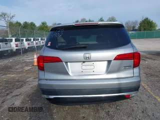 2016 Honda Pilot Touring with VIN 5FNYF6H90GB024902, listed as a IAAI auction lot 41948563 with 148,598 mi miles. Bid and sale history available at carsss.com. Image 16.