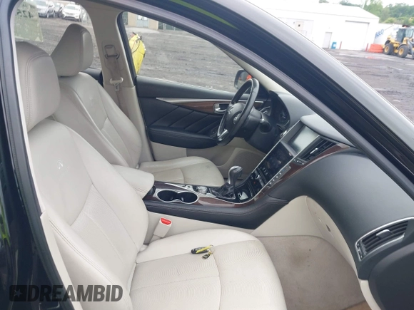 2014 Infiniti Q50 Premium z VIN JN1BV7AR3EM697330, wystawiony jako IAAI lot #42536087 z przebiegiem 231 222 mil mil oraz . Historia ofert i sprzedaży dostępna na DreamBid. Obrazek 5.