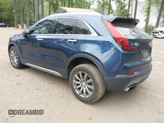 2019 Cadillac XT4 FWD Premium Luxury with VIN 1GYFZCR46KF163883, listed as a IAAI auction lot 42403733 with 80,275 mi miles and . Bid and sale history available at DreamBid. Image 3.