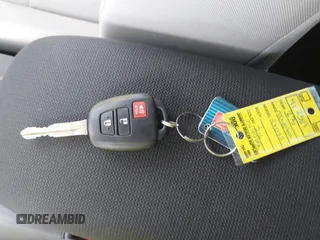 2023 Toyota Corolla Cross L with VIN 7MUAAAAG4PV044969, listed as a IAAI auction lot 42388727 with 26,071 mi miles and . Bid and sale history available at DreamBid. Image 11.