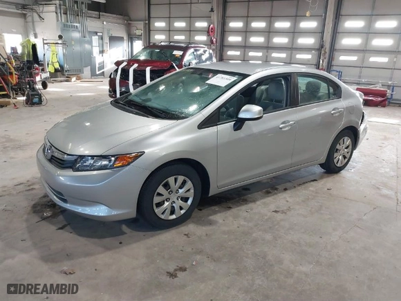 2012 Honda Civic Sdn LX with VIN 19XFB2F58CE067475, listed as a IAAI auction lot 41781509 with 126,657 mi miles. Bid and sale history available at carsss.com. Image 2.