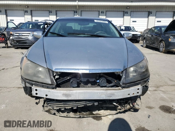 2007 Acura RL Technology z VIN JH4KB16677C001125, wystawiony jako Copart lot #46943485 z przebiegiem 191 097 mil mil oraz Szkoda całkowita • Salvage title. Historia ofert i sprzedaży dostępna na DreamBid. Obrazek 5.