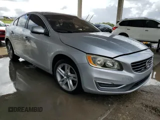2015 Volvo S60 T5 Drive-E Premier с VIN YV140MFB7F1314727, выставлен на аукционе Copart как лот 84855544 с пробегом 128 854 миль миль и Списание • Salvage title. История ставок и продаж доступна на DreamBid. Изображение 4.