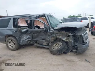 2020 Chevrolet Tahoe LS z VIN 1GNSCAKC3LR101733, wystawiony jako IAAI lot #41912918 z przebiegiem 153 731 mil mil oraz . Historia ofert i sprzedaży dostępna na DreamBid. Obrazek 6.